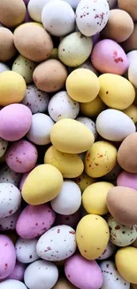 Colorful speckled Easter eggs in pastel colors.