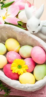 Colorful Easter eggs with rabbit figurine in basket.