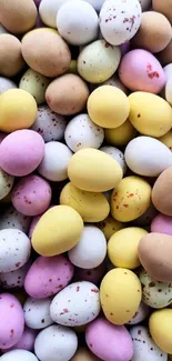 Colorful pastel Easter eggs wallpaper with pink, yellow, and white hues.