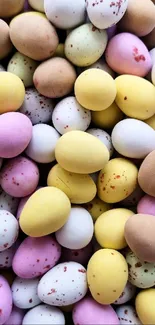 A collection of colorful, speckled Easter eggs in pastel shades.