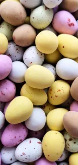 Colorful pastel Easter eggs with speckled designs in a vibrant arrangement.