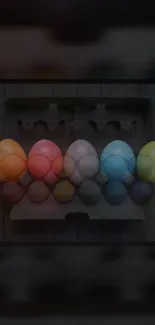 Colorful Easter eggs in a carton, vibrant mobile wallpaper.