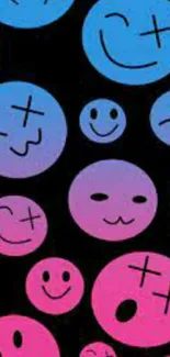 Colorful emoji faces on black background wallpaper.