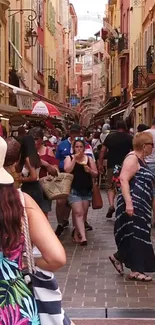 Busy European street with colorful buildings and visitors.