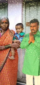 Family portrait with vibrant traditional attire in a colorful setting.