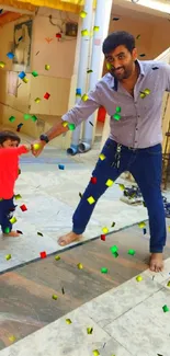 Father and child playfully interacting outdoors in bright sunshine.