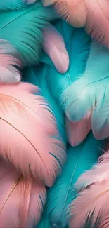 Pastel pink and teal feather mobile wallpaper.