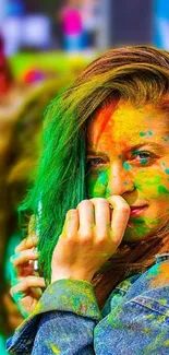 Colorful portrait of a woman at a festival, splashed with vibrant hues.