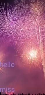 Vibrant fireworks lighting up the night sky over a crowd.