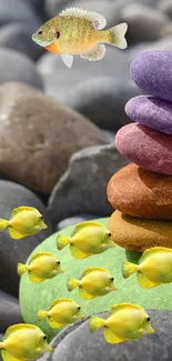 Colorful fish swim around stacked stones on a pebbly background.