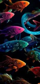 Vibrant fish swim in dark waters, showcasing colors.