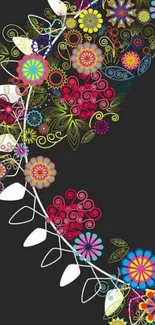 Colorful floral art wallpaper with intricate flower patterns on a black background.