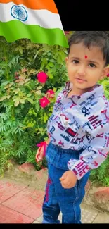 A child stands in a garden with an Indian flag overlay.