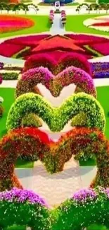 Vibrant floral garden with colorful heart-shaped flower arrangements.