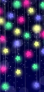 Vibrant colorful flowers glow in night sky wallpaper with starry background.