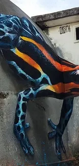 Vibrant street art of a painted frog on an urban wall.