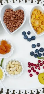 Breakfast platter with fruits, nuts, and cereals.