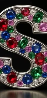 Vibrant gemstone letter S with colorful jewels.