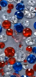 Colorful gemstone pattern wallpaper with red, blue, and silver stones.