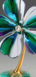 Elegant glass flower with blue and green petals.