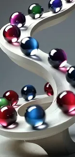 Colorful glass marbles on a spiral sculpture in a modern art design.
