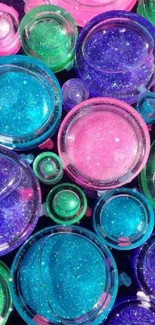 Colorful glitter-filled bubbles on a vibrant background.