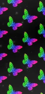 Vibrant glitter butterfly wallpaper with colorful wings on a black background.