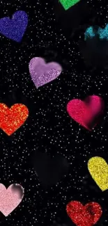 Colorful glitter hearts on a starry black background.