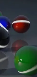 Colorful marbles with a glossy finish on a dark background.