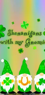 Playful gnomes and shamrocks on vibrant rainbow background wallpaper.