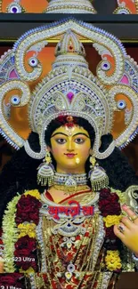 Intricate Goddess Durga statue adorned beautifully with vibrant decorations.