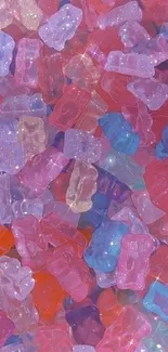 Colorful gummy bears wallpaper in pink and purple hues.