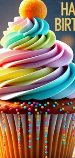 Colorful cupcake with rainbow frosting for a birthday celebration.