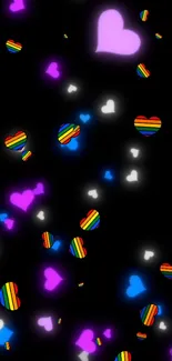 Glowing hearts wallpaper with colorful patterns on a black background.