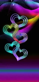 Neon hearts glowing on a dark background.