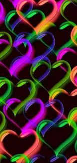 Vibrant neon heart pattern on black background.