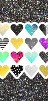 Colorful hearts on a glittery black background wallpaper.