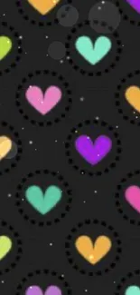 Colorful hearts on black wallpaper background for mobile phones.