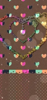 Colorful heart pattern wallpaper with brown background.