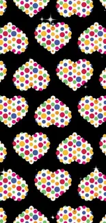 Colorful polka dot hearts on black background.