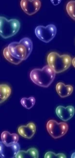 Vibrant wallpaper with glowing, colorful hearts on dark background.