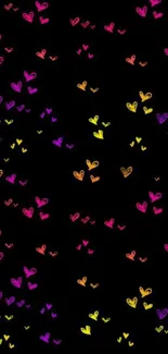 Colorful heart pattern wallpaper with vivid black background.