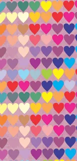 Vibrant mobile wallpaper with colorful hearts on pink texture.