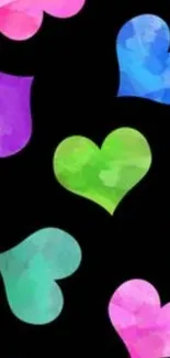 Colorful hearts pattern on black background wallpaper.