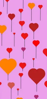 Heart pattern wallpaper with pink background.