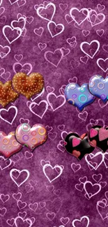 Colorful heart patterns on a purple background wallpaper.