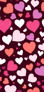 A vibrant wallpaper featuring colorful hearts on a maroon background.