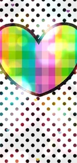 Multicolored heart on polka dot background wallpaper.