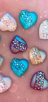 Colorful hearts stone pattern with glitter detail on a pink background.