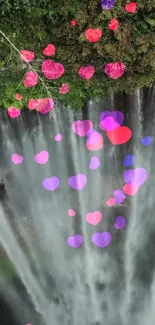 Vibrant mobile wallpaper featuring pink and purple hearts over a waterfall backdrop.